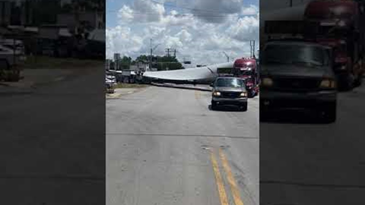 Train Cuts Through Wind Blade at Crossing || ViralHog